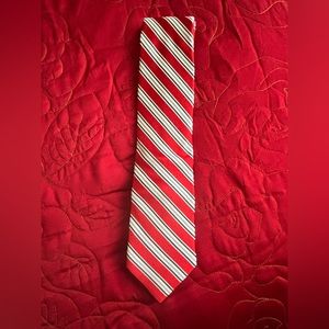 Club room, red blue and white striped tie